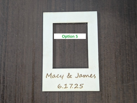 Close-up example of font choice five engraved on a personalized birch mini photo frame magnet.