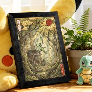 May include: A rectangular black frame containing a print of a green creature with large eyes and wings flying in a forest near a wooden shrine. The artwork features stylized trees, falling leaves, a red sun, and Japanese text in the corners.