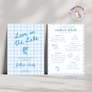 May include: Two light blue and white gingham patterned cards. The left card says "Love on the Lake" with a fish illustration and "Bachelorette Weekend Celebrating Jillian Ledy, June 2026, Lake Tahoe, CA." The right card lists weekend details.