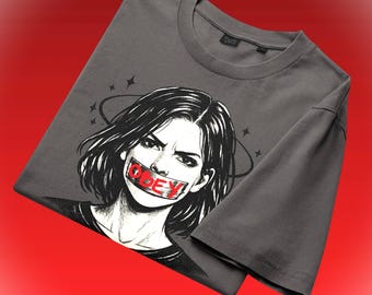 T-shirt met OBEY-afbeelding • Shirt met rebelse feministische kunst • Alt grunge-top