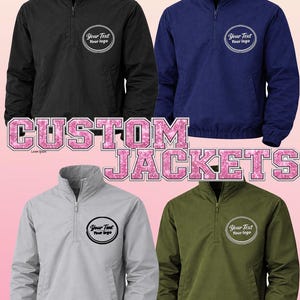May include: Four custom jackets in black, navy blue, gray, and olive green are displayed. Each jacket has a quarter-zip closure and a circular logo area. The text "CUSTOM JACKETS" is displayed in pink, glittery letters.