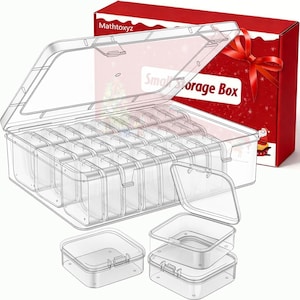 May include: A clear plastic storage container with a hinged lid and multiple internal compartments, accompanied by two smaller individual clear plastic boxes with lids. The set is presented with a red gift box featuring a red ribbon bow.