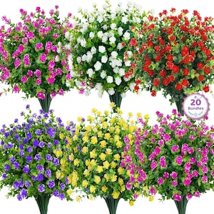 May include: A collection of twenty artificial flower bundles featuring small blossoms in shades of pink, white, red, purple, and yellow, each with green stems and foliage, arranged in a grid pattern with a circular badge stating 20 Bundles.