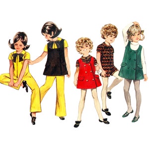 May include: Five girls wearing different outfits. The girl on the left is wearing a yellow jumpsuit with a black bow. The girl in the middle is wearing a red dress with a black collar and buttons. The girl on the right is wearing a green dress with a white collar and buttons.