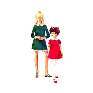 May include: Illustration of two young girls wearing dresses. One girl is in a green dress with white lace trim and a white collar. The other girl is in a red dress with a white collar. Both dresses have a retro style.