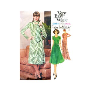May include: A vintage sewing pattern for a dress with a green floral print, a green dress with a sash, and a pink dress with a ruffled skirt. The pattern is from Very Easy Vogue and is designed by Diane Von Furstenberg.