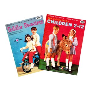 May include: Two vintage knitting pattern books from Coats & Clark's. The book on the left is titled "Toddler Sweaters" and features a child riding a tricycle. The book on the right is titled "Knit and Crochet for Children 2-12" and features a child with a donkey. Both books feature the Red Heart yarn logo.