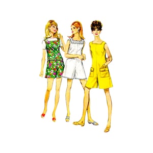 May include: Three women wearing different styles of short, sleeveless dresses. The woman on the left is wearing a green and white floral print dress. The woman in the middle is wearing a white dress with a lace trim. The woman on the right is wearing a yellow dress with pockets.