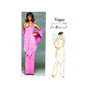 May include: A vintage Vogue sewing pattern featuring a two-piece outfit with a flowing top and wide-legged pants. The pattern is designed by Leo Narducci and is for a sleeveless top and pants with a draped, asymmetrical design. The model is wearing a pink version of the outfit on the left side of the image, and a white version on the right.