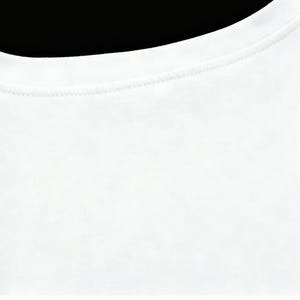 May include: Close-up of a white crew neck t-shirt. The neckline is visible, with a finely stitched seam. The fabric appears to be a soft, opaque material. The background is black.