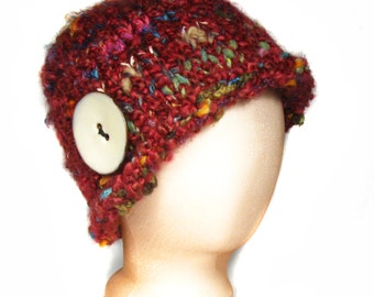 257 Vienna cap hat:  maroon with flecks of color and a boffo moveable button.