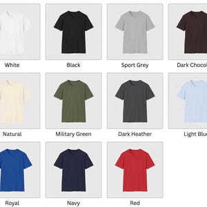 May include: A collection of short-sleeved t-shirts in various colors, including white, black, sport grey, dark chocolate, natural, military green, dark heather, light blue, royal, navy, and red. Each shirt is displayed on a white background.