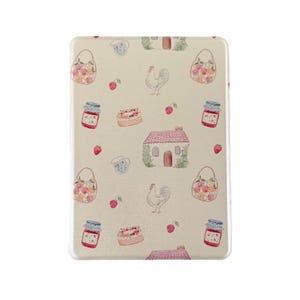 May include: A rectangular cream-colored case with a repeating pattern of watercolor illustrations. The pattern includes strawberries, jam jars, houses, roosters, teacups, and baskets of fruit. The case has a glossy finish.