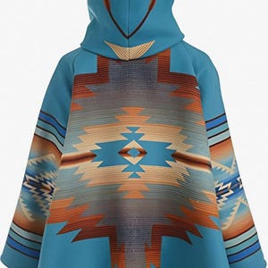 May include: A turquoise hooded poncho with a Southwestern-inspired geometric pattern in shades of orange, tan, and blue. The poncho features a hood with decorative accents and a flowing silhouette, perfect for layering.