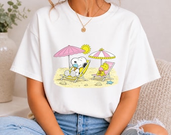 Snoopy e Woodstock Beach che mangiano il gelato (Download immediato in formato PNG)