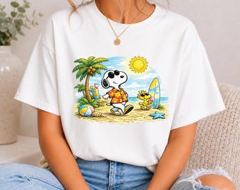 Snoopy e Woodstock in una giornata di passeggiata su una spiaggia tropicale (Download immediato in formato PNG)