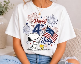 Snoopy e Woodstock con bandiera americana e fuochi d'artificio per il 4 luglio (download immediato in formato PNG)