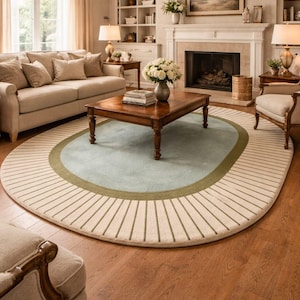 Handgetuft wollen ovaal vloerkleed, geometrisch radiaalpatroon, blauwgroen crème olijfgroen, aangepaste maten