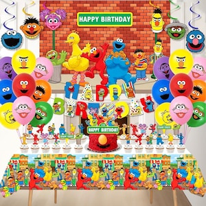 May include: A white ceramic mug with a black handle and the text "But First, Coffee" in a bold, black font. The mug is set against a neutral background, highlighting its simple design.