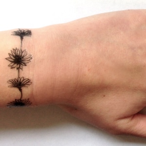 Temporary tattoo of a hand drawn daisy chain unique to Inkwear 13x4 cm (3 copies)