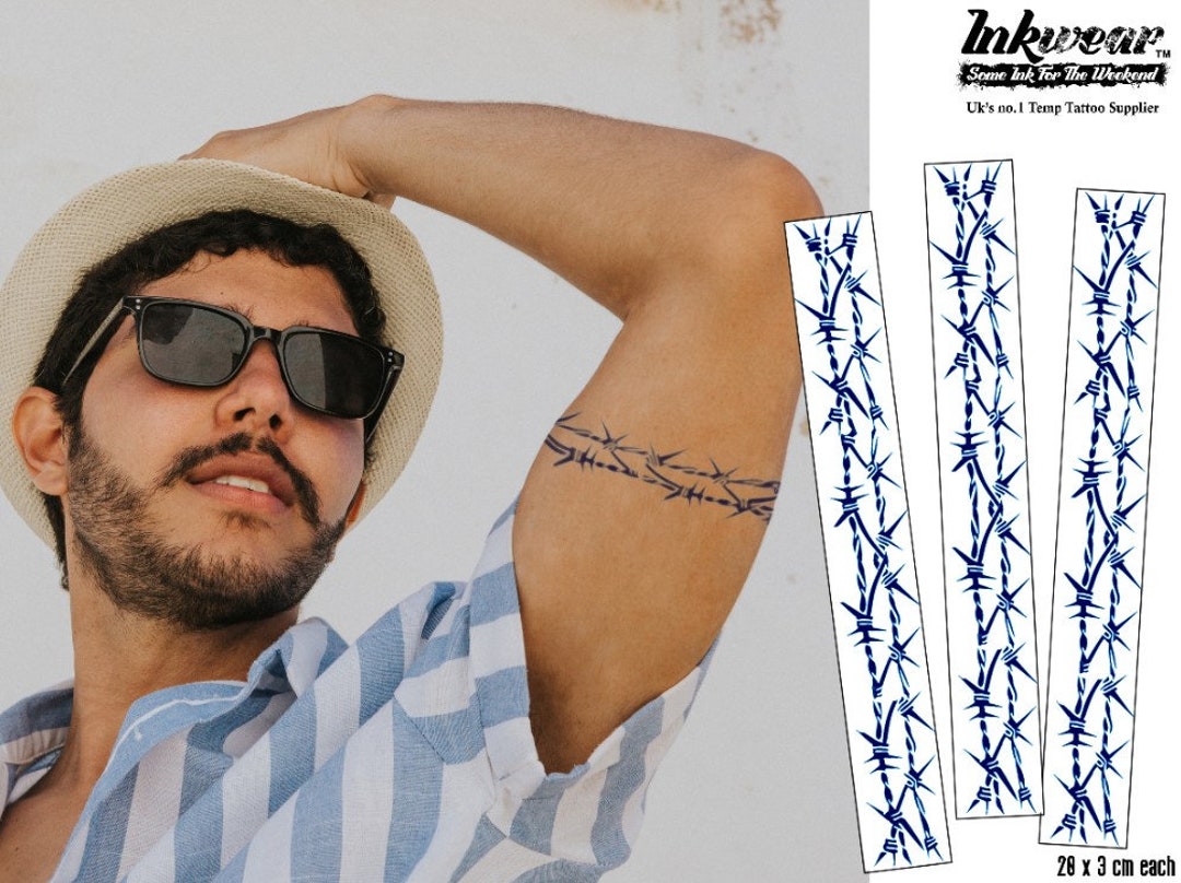 Design Vivaci E Uomo Con Tatuaggio A Braccio Resistenti Per Un'espressione Creativa - Foto 10