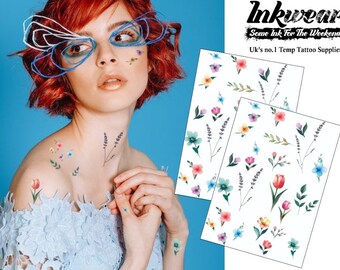 May include: Two sheets of temporary tattoos with watercolor floral designs. The tattoos feature a variety of flowers, including lavender, tulips, and daisies. The sheets are white with a black border. The text "Inkwear" and "Some Ink For The Weekend" is printed on the top of the sheets. The text "UK's no.1 Temp Tattoo Supplier" is printed on the bottom of the sheets.