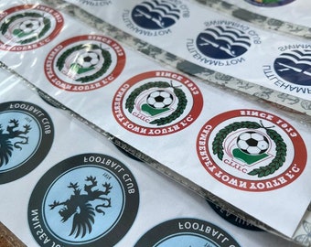 Bitte vervollständigen Sie diese Übersetzung. Temporäre Tattoo-Packs mit Club-/Team-Logo – entworfen für Team-Events