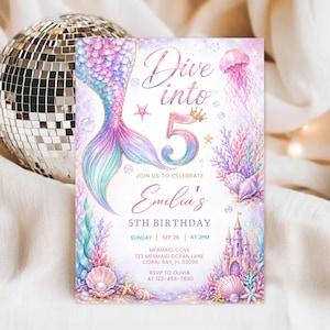 May include: A rectangular birthday invitation card featuring a watercolor mermaid tail, a large number 5 with a crown, a jellyfish, seashells, coral, and a castle. The text reads: Dive into 5, JOIN US TO CELEBRATE, Emilia's, 5TH BIRTHDAY, SUNDAY, SEP 26, AT 2PM, MERMAID COVE, 123 MERMAID OCEAN LANE, CORAL BAY, FL 33036, RSVP TO OLIVIA AT 123-456-7890.