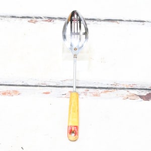 Vintage . Androck USA Slotted Spoon Serving Spoon Ladle Vintage Red and Brown Wood Handle