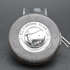 Vintage . Collectible Tool Lufkin Rule Chrome-Clad Steel Tape Measure 50 FT Hand Rewind USA
