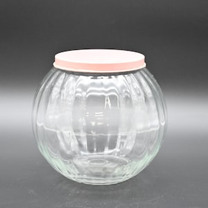 Antike 1924 Verkäufer / Hoosier Glaskugelkanister / Glasreißverschlussrand, rundes, geripptes Glas mit rosa Deckel
