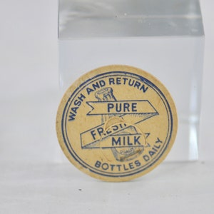 Vendimia. Tapa de botella de leche fresca pura Bebida botella de leche pura Tapa de cartón