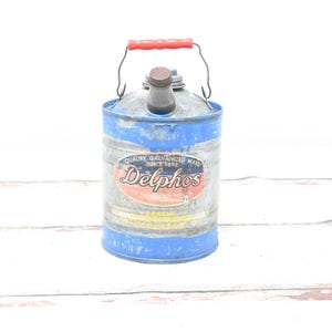 Vintage Delphos 2 gallon zinkolieblikje brandstofblik beide doppen aanwezig