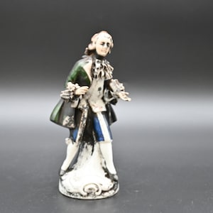 Vintage .  Porcelain Man Figurine In Dark Green Waistcoat