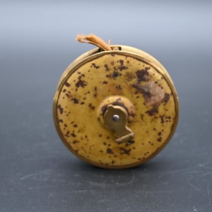 Vintage . Collectible Tool Lufkin Rule Brass Case Cloth Tape Measure 50 FT Hand Rewind USA
