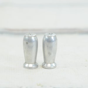 Vintage . Art Deco Atomic Age Bullet Shape Stainless Salt and Pepper Shakers