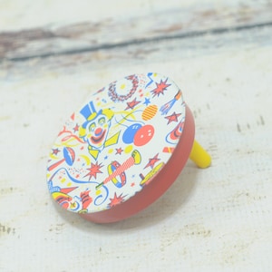 Vintage . Tin Litho Clown Noisemaker Shaker Spinner Red  Yellow Toys Made in USA