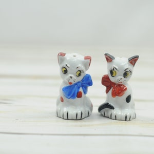Vintage . Pico Salt And Pepper Shakers Ceramic Spotted Cat and Dog With Bows