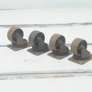 Four .Vintage Industrial Casters & Brackets Vintage 2 3/8" Caster Wheels