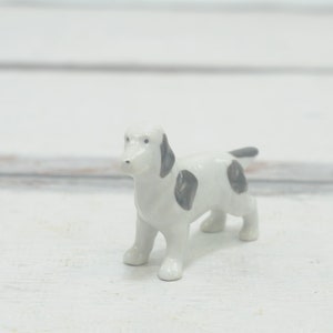 Vintage . Porcelain Dog Figurine With With Brown Spots  Spaniel Beagle? Collectible