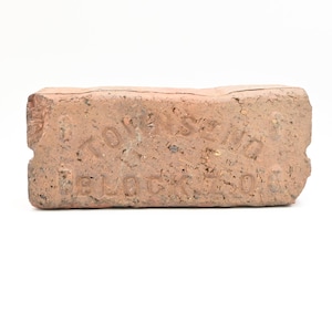 Antieke berging architectonisch decoratief bestrating bestrating straatbaksteen Townsend Block