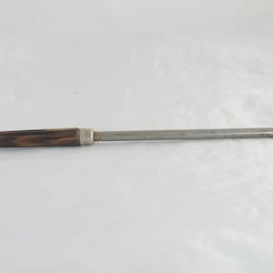 May include: A brown and black wooden handled steel knife sharpener.