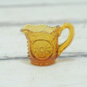 Vintage . Smith? Amber Daisy and Button Glass Individual Creamer Pressed Glass  EUC