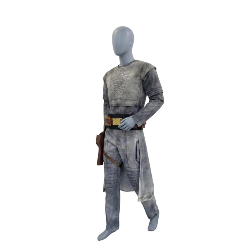 May include: A gray costume with a textured top, long sleeves, and matching pants. The outfit includes a brown belt with a gold buckle, a holster, and a long, flowing panel on the side. The mannequin is standing on a white background.