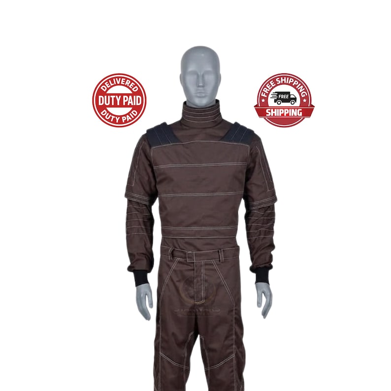 May include: Brown racing suit with white stitching and black accents. The suit features a high collar, long sleeves, and a belt. The suit is displayed on a mannequin.