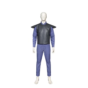 May include: A costume set featuring a smooth black chest plate with prominent shoulder guards worn over a light purple long-sleeved shirt and matching light purple trousers. The ensemble is displayed on a neutral mannequin against a white background.
