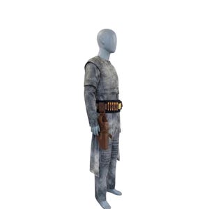 May include: A gray costume with a long-sleeved top, pants, and a long coat. The costume includes a brown belt with bullet holders and a brown holster. The mannequin is standing on a white background.