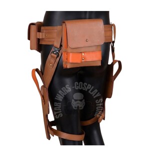 May include: A brown leather utility belt with multiple pouches and holsters. The belt features an orange accent and is designed for cosplay. The image includes the text "STAR WARS - COSPLAY STORE".