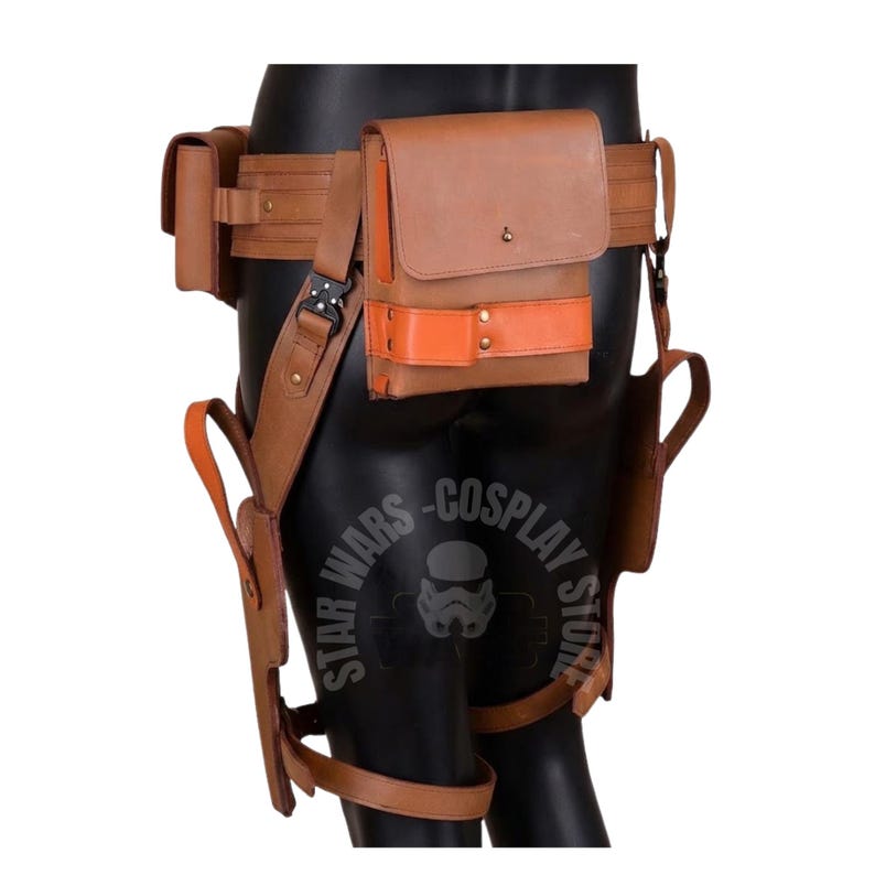 May include: A brown leather utility belt with multiple pouches and holsters. The belt features an orange accent and is designed for cosplay. The image includes the text "STAR WARS - COSPLAY STORE".
