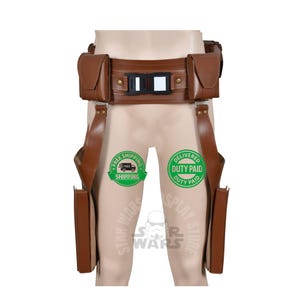May include: Brown leather utility belt with two pouches and two holster-style leg straps. The belt has a black and white buckle, designed for cosplay or costume use.